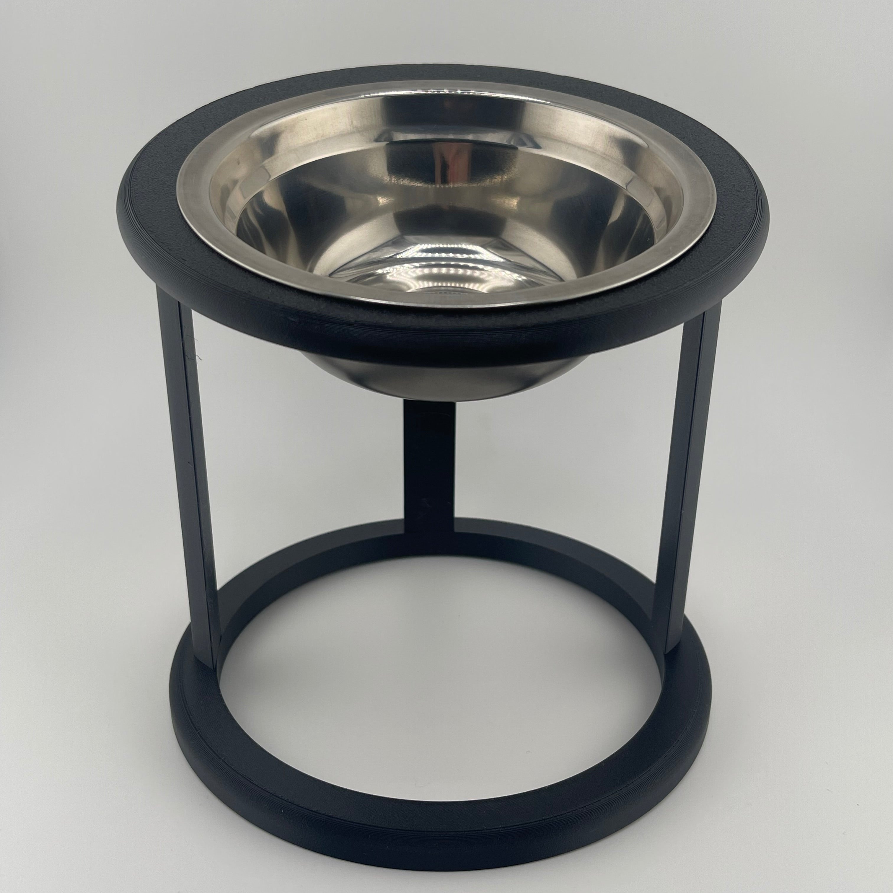 Black elevated cat bowl with stainless steel insert, front view, raised cat feeder UK



