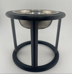 Black elevated cat bowl on white background, minimalist raised feeder for cats UK