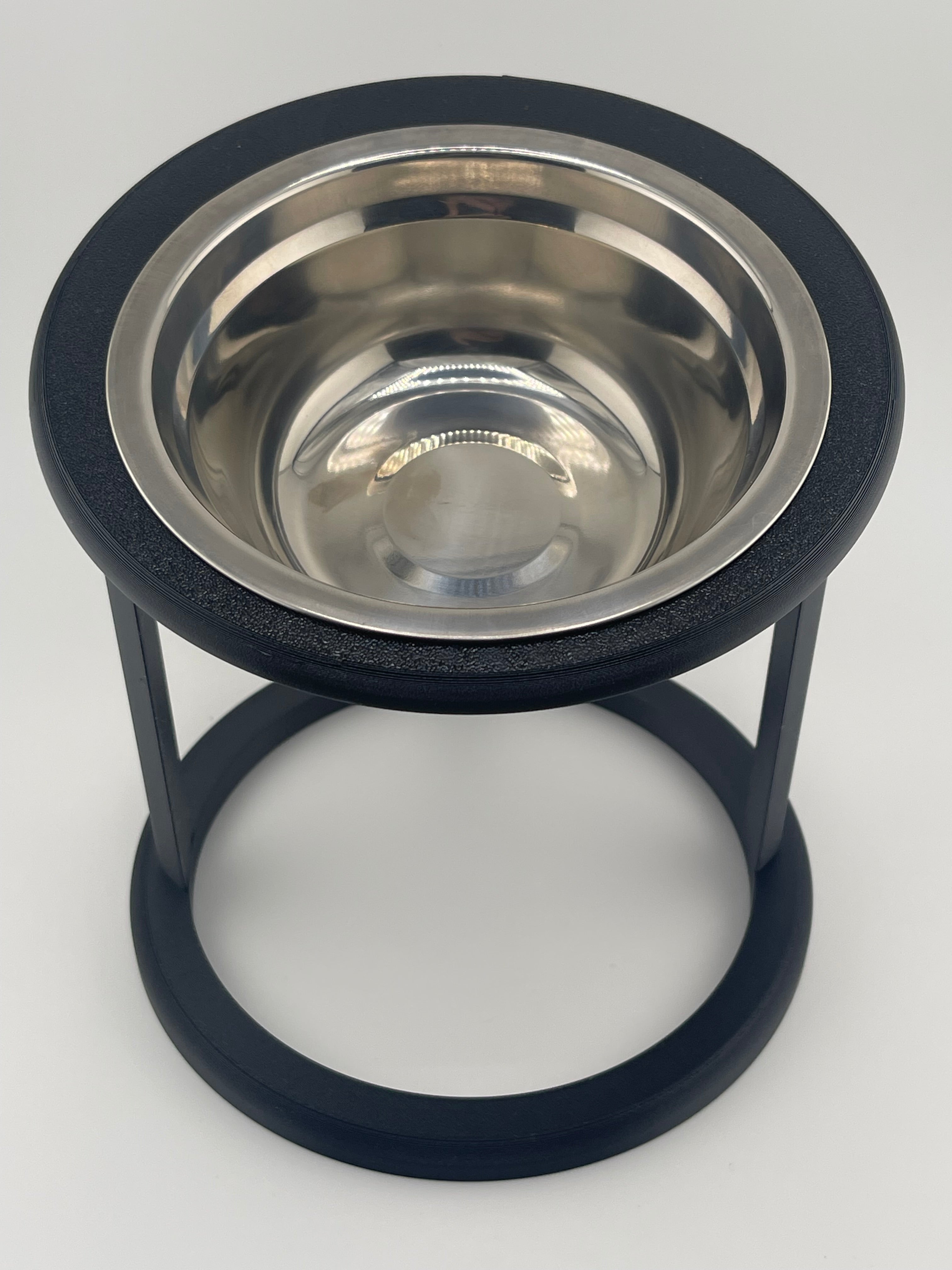 Black cat riser bowl with open frame stand, top-down angle, elevated feeder UK