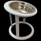 Marble raised cat feeder showing tilted angle, stainless steel bowl detail, elevated cat bowl UK
