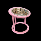Pink raised cat feeder with circular base, front view, elevated cat bowl UK
